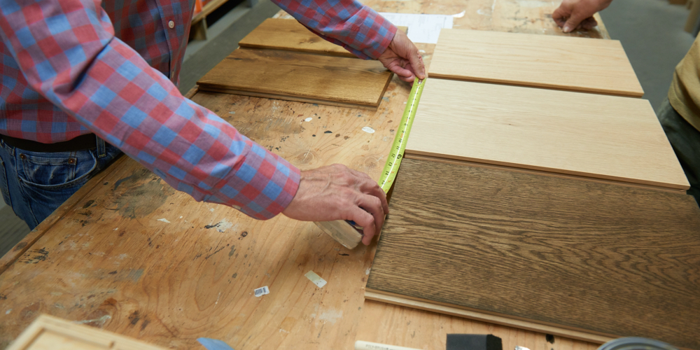 Measuring plank width in custom sample shop