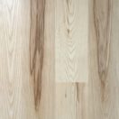 Ash, like birch, contains a mixture of heartwood and sapwood, often in the same plank. To complement these contrasting colors, Craftsbury, a finish with a low sheen, brings out white accents in both the board’s dark and light colors.