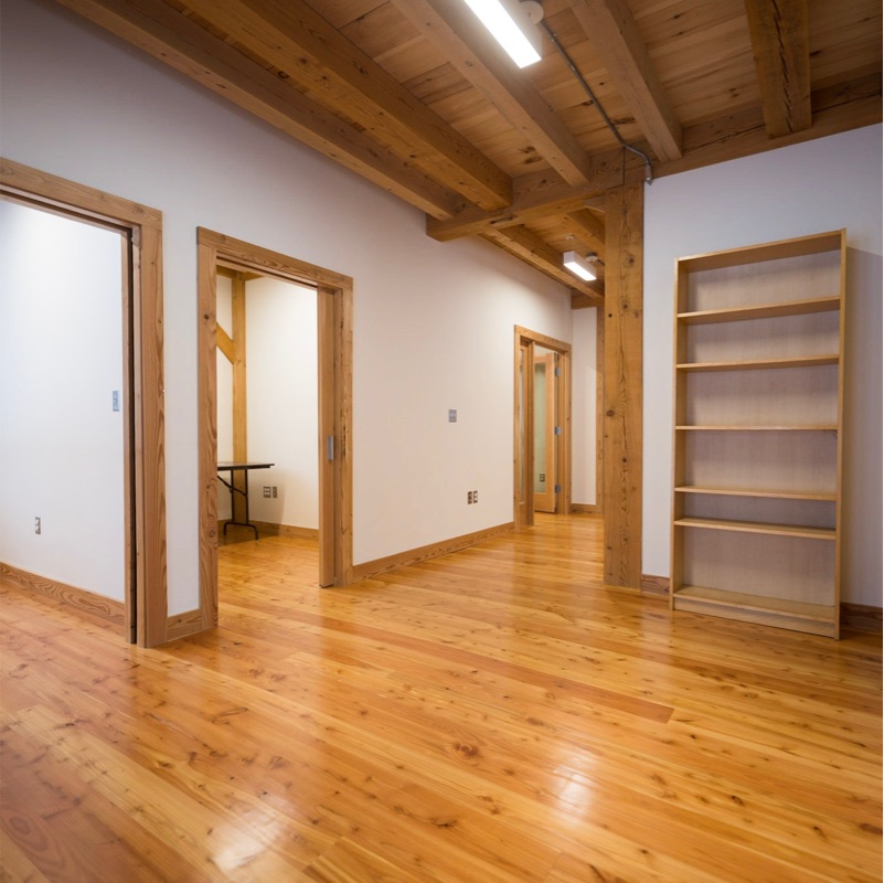 larch plank flooring - office hallway