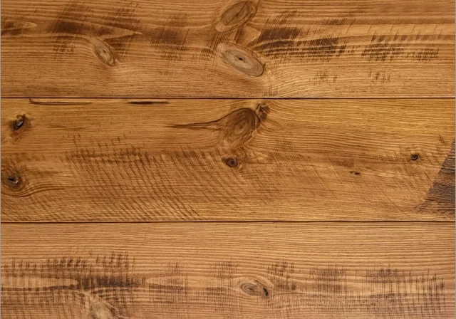 Heart pine wide plank flooring in the Sweet Home finish with sawmark texturing